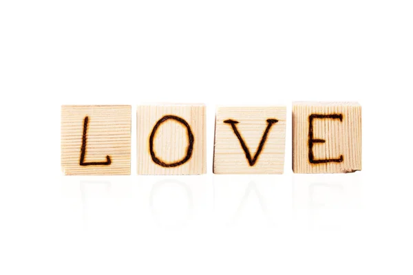 Romantyczny napis listów na na białym tle o lekkie drewniane kostki — Zdjęcie stockowe