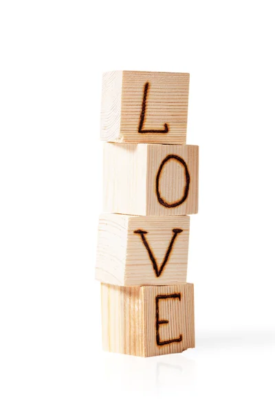 Romantyczny napis listów na na białym tle o lekkie drewniane kostki — Zdjęcie stockowe