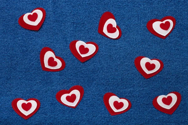 Textile hearts. Romantic love theme on jeans background — Stock Photo, Image