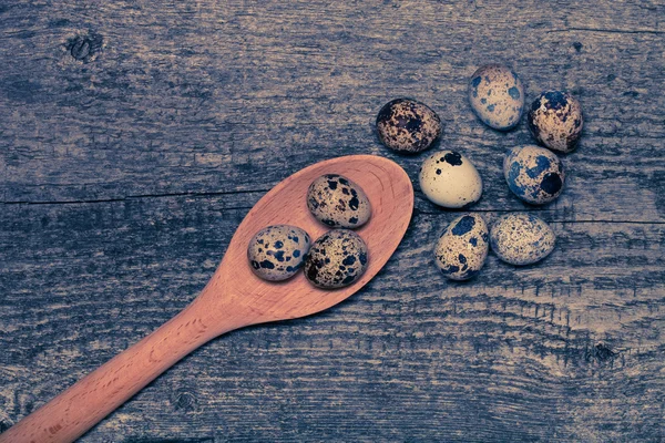 Composition with quail eggs. Wooden texture for background. Tone — Stock Photo, Image