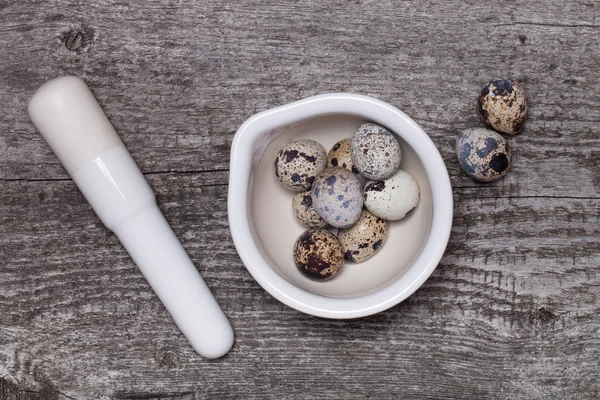 Composition with quail eggs. Wooden texture for background — Stock Photo, Image