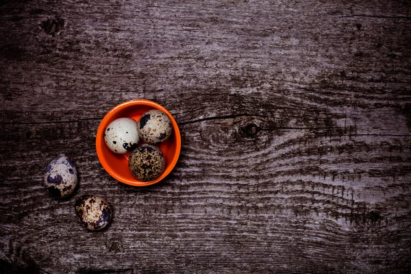 Composition with quail eggs. Wooden texture for background. Tone — Stock Photo, Image