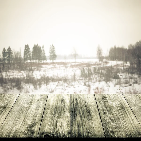 Snowy winter in Russia. View from dark wooden gangway, table or — Stock Photo, Image