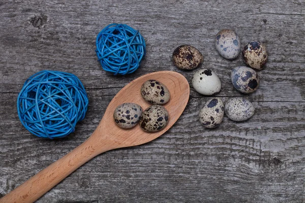 Composition with quail eggs. Wooden texture for background — Stock Photo, Image