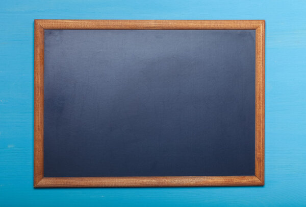 New blue wooden texture with chalk board for background. Toned