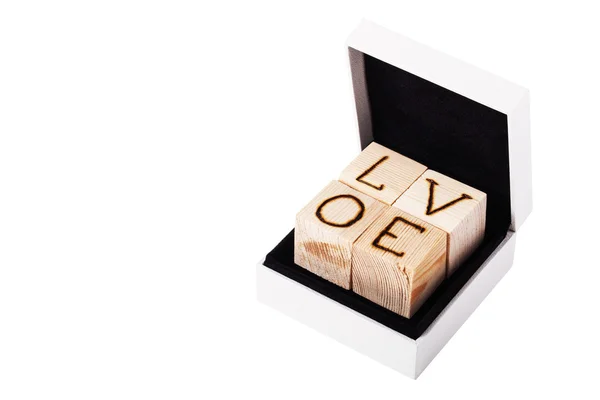 Inscripción romántica de letras sobre cubos de madera clara en blanco b —  Fotos de Stock