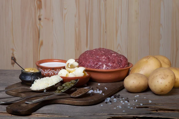 Set de ingredientes para cocinar sobre fondo de madera viejo — Foto de Stock