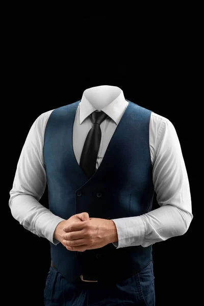 暗い背景に白いシャツ ベストとヘッドレスタイのビジネスマン — ストック写真