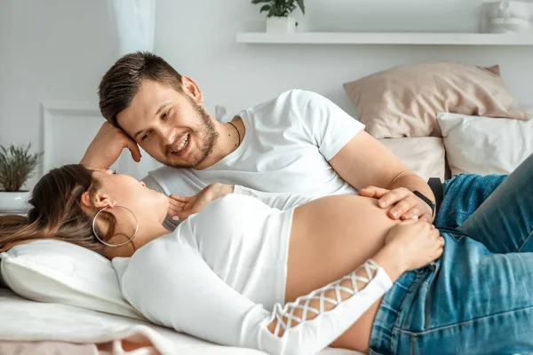 Pregnant Girl Her Husband Lie Bed Beautiful Belly Young Attractive — Stock Photo, Image