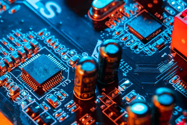 Electronic components on a printed circuit board. Resistor, inductor and capacitor on PCB. Concept Electrical engineering, microprocessor, technology. Selective focus