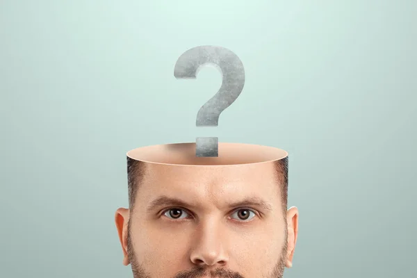 the male head is open instead of the brain with question marks. Creative background, concept of problem solving, searching for an answer, task, thinking
