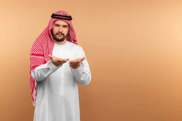 Arab Male Businessman National Clothes Points His Hands Something Beige — Stock Photo, Image