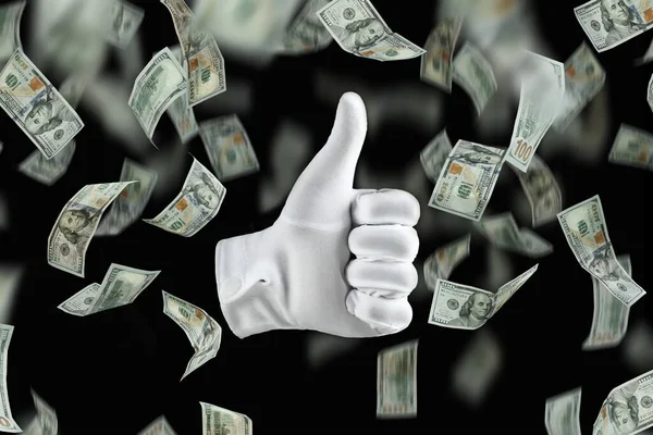Кисть Рука Белой Перчатке Показывает Большой Палец Вверх Доллары Падают — стоковое фото