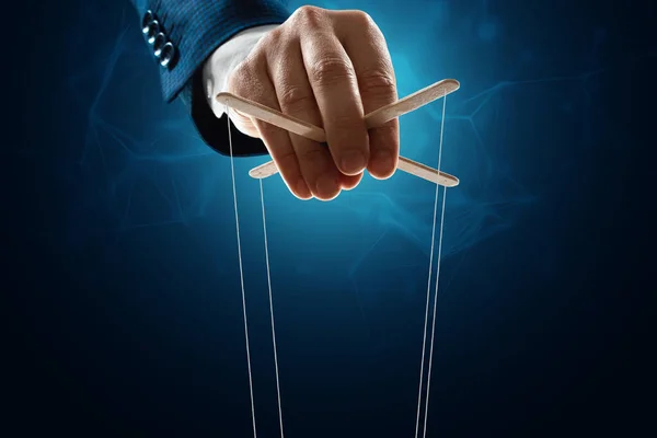 The puppeteer\'s hand is large. The concept of world conspiracy, world government, manipulation, world control
