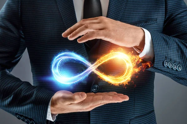 Businessman Showing Infinity Sign Fire Ice Sign Gray Background — Stock Photo, Image