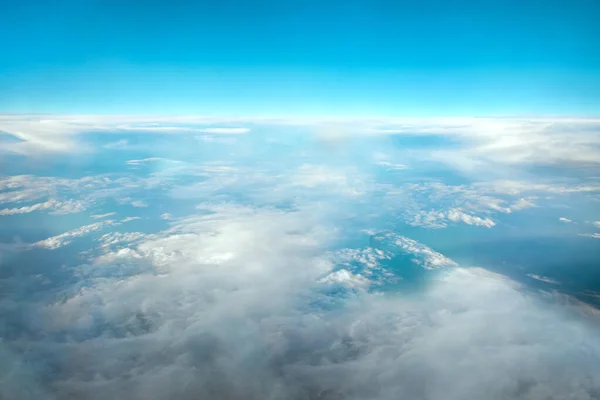 Landscape, the sky above the clouds. International cargo transportation, air travel, transport, air travel, vacation. Copy space