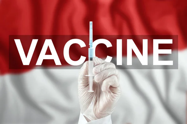 Een Spuit Met Een Vaccin Hand Van Arts Tegen Achtergrond — Stockfoto