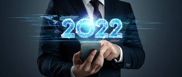 蓝色全息图编号2022一位商人的背景新年快乐 现代设计 网站首页 新年卡片 — 图库照片