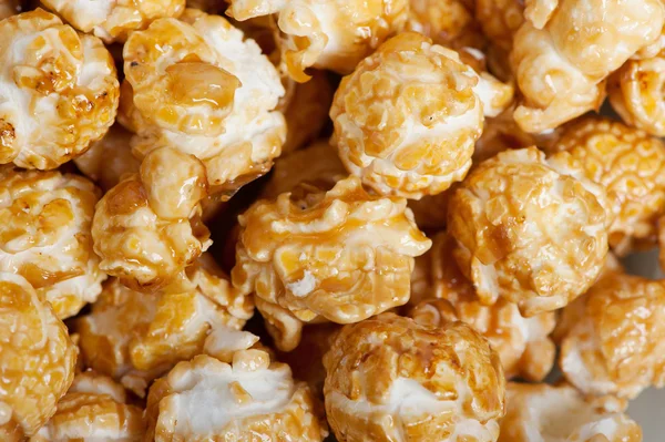 Karamel popcorn achtergrond — Stockfoto