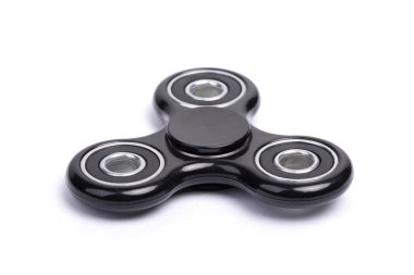 Beyaz arkaplan üzerinde izole siyah hareketli spin yakın çekim