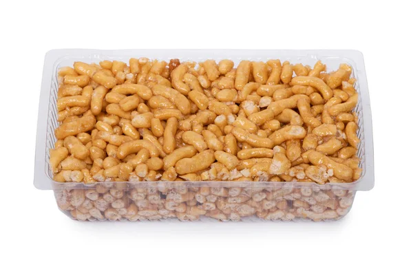 Beyaz zemin üzerinde izole plastik şeffaf kutuda bal ile Chak-Chak