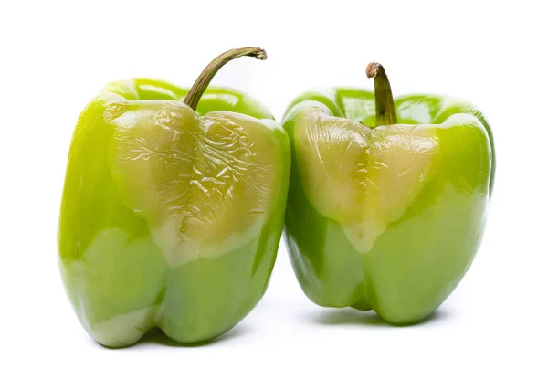 Rotte Groene Paprika Geïsoleerd Witte Achtergrond — Stockfoto