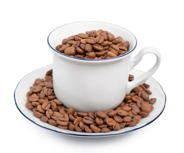 Fehér csésze kávébabbal — Stock Fotó