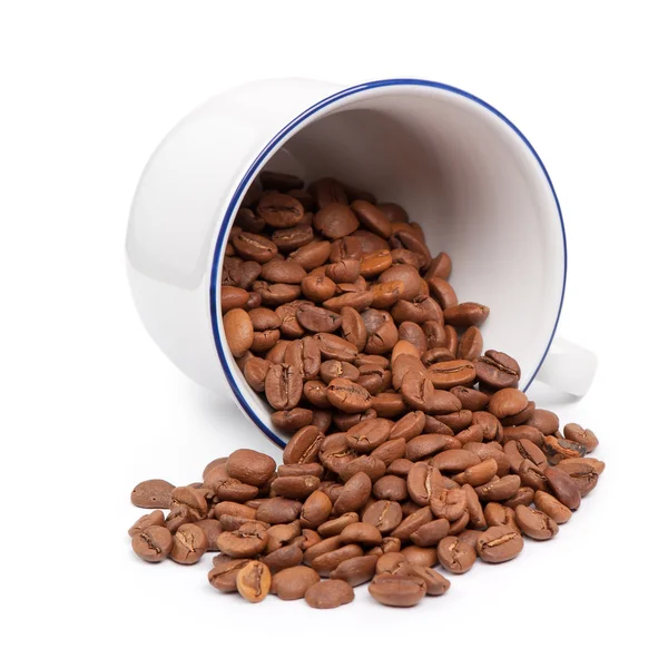 White cup with coffee beans — Stock Photo, Image