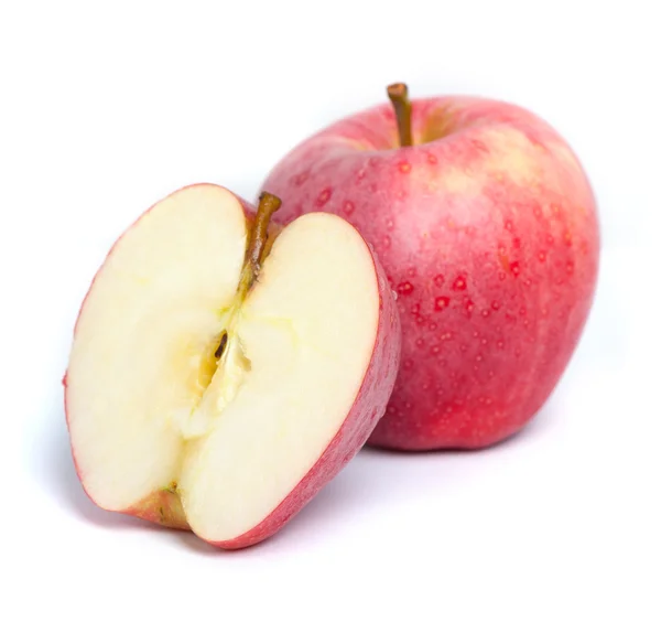 Röda äpplen på vit — Stockfoto