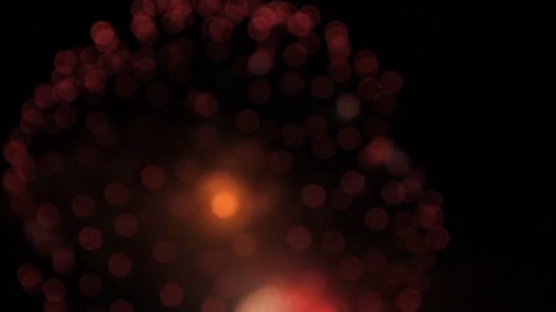 Red-and-white balls of fireworks. Bokeh. — Stock Video