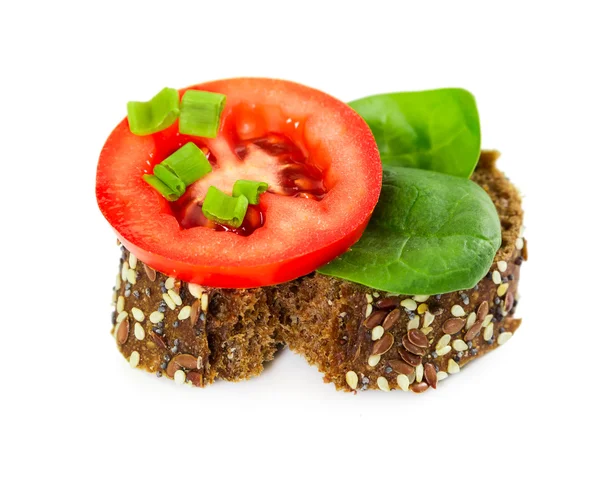 Small sandwich with tomato, spinach and onion — Stock Photo, Image