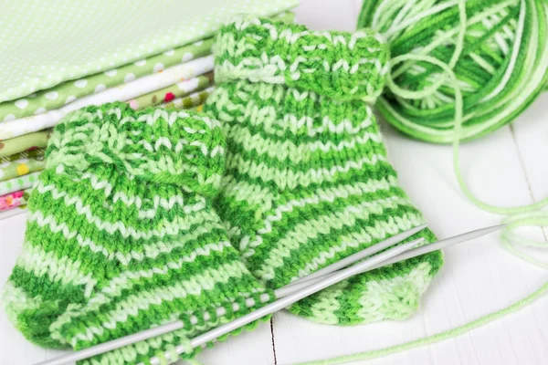 Baby knitting socks — Stock Photo, Image