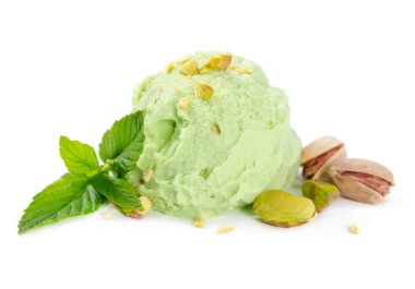 Scoop of pistachio ice cream with nuts and mint  clipart