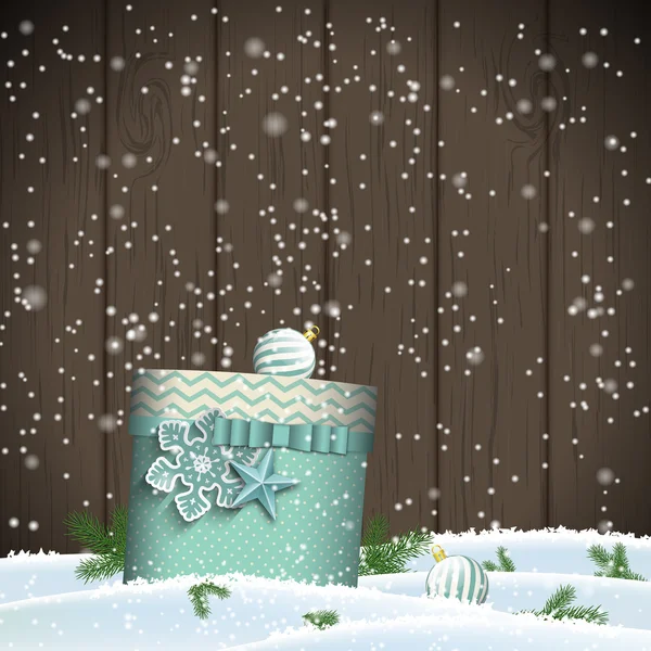 Weihnachtsgrußkarte mit blauer Geschenkschachtel in Schneewehe, Winterthema, Illustration — Stockvektor