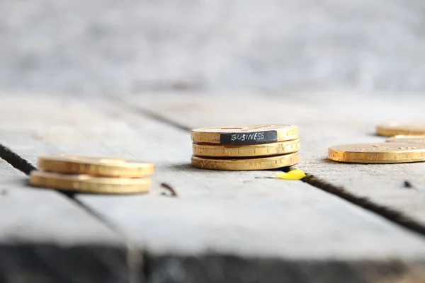 Zakelijke tekst en munten — Stockfoto