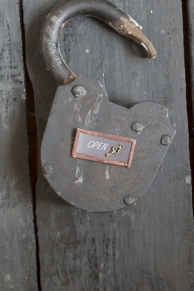 Open sign and old padlock — Stock Photo, Image