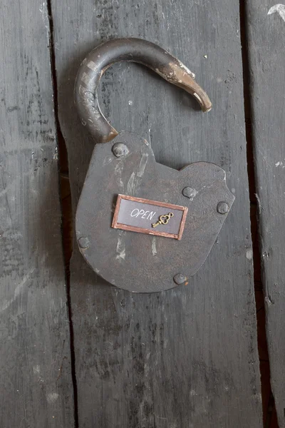 Open sign and old padlock — Stock Photo, Image