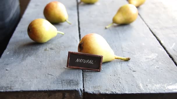 Juicy flavorful pears and text natural — Stock Video