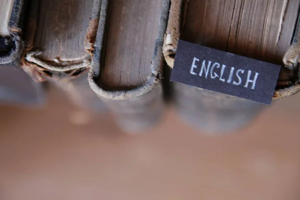 English language creative concept in vintage style. Education background.