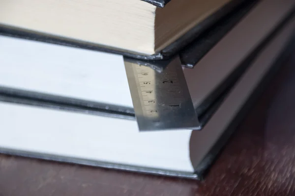 Books and ruler — Stock Photo, Image