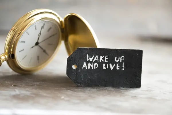 Wake up en live en zakhorloge — Stockfoto