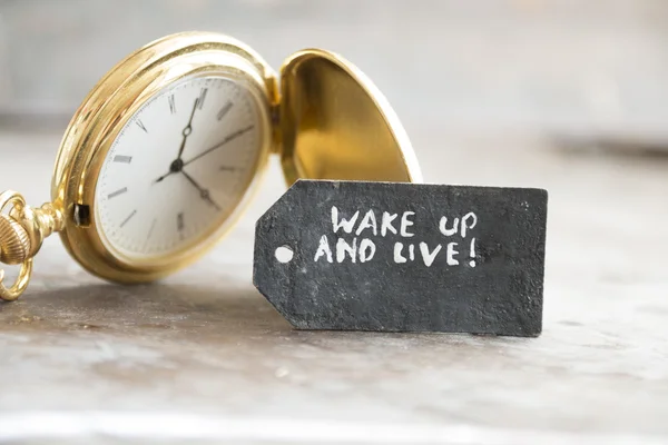 Despertar y vivir y reloj de bolsillo —  Fotos de Stock