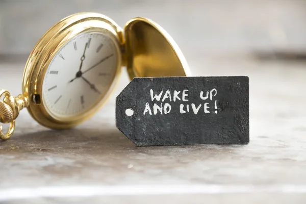 Wake up en live en zakhorloge — Stockfoto