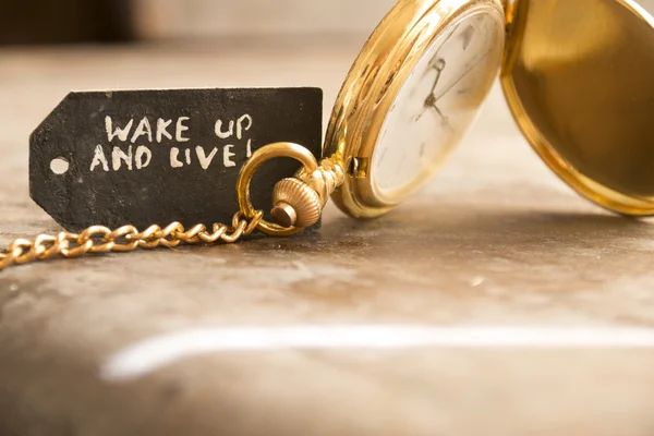 Despertar y vivir y reloj de bolsillo — Foto de Stock