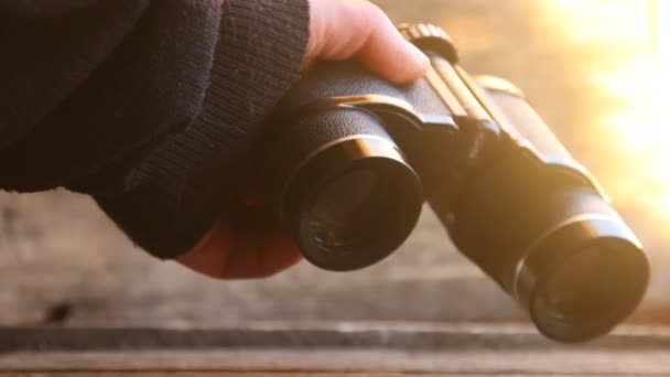 Vision word on binoculars. Sunset. — Stock Video