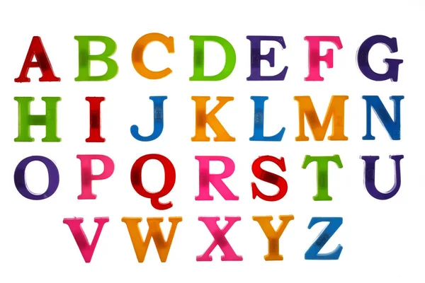 Letras Coloridas Plástico Alfabeto Inglês Fundo Branco Isolado Vista Superior — Fotografia de Stock