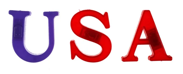 Слово Сша Выложено Разноцветными Пластиковыми Буквами Выделенными Белом Фоне — стоковое фото