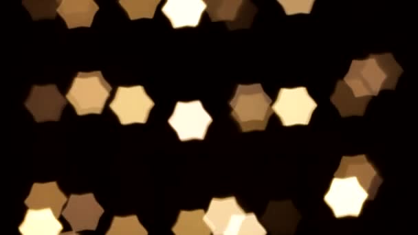 クローズアップから六角形の形でクリスマス ガーランドの光を点滅させる — ストック動画