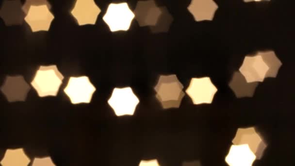 Blinkende Lichter Einer Weihnachtsgirlande Form Von Sechsecken Unscharf Hintergrund Nahaufnahme — Stockvideo