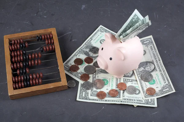 Pig Piggy Bank Stands One Dollar Bills Next Mechanical Bills — Stock Photo, Image